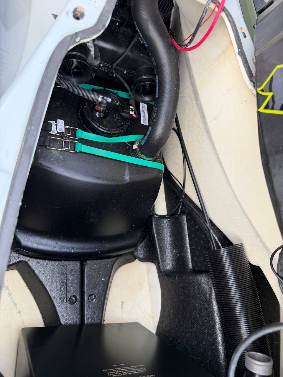 Straps, pump, and routed hoses