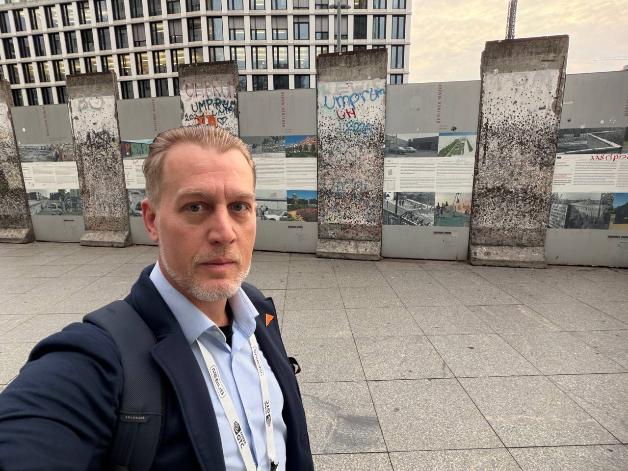 Standing before the Berlin Wall memorial