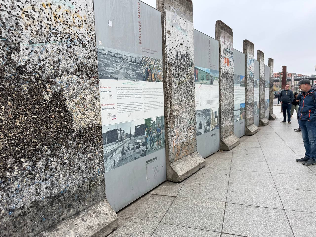 The bullet-holed panels at the memorial